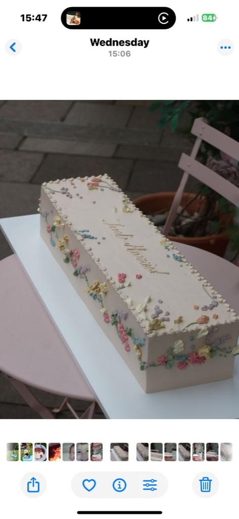 Close-up of artisan piped wedding cake detail