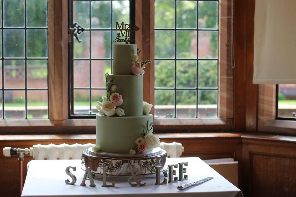 Wedding cake display in a manor-house reception room
