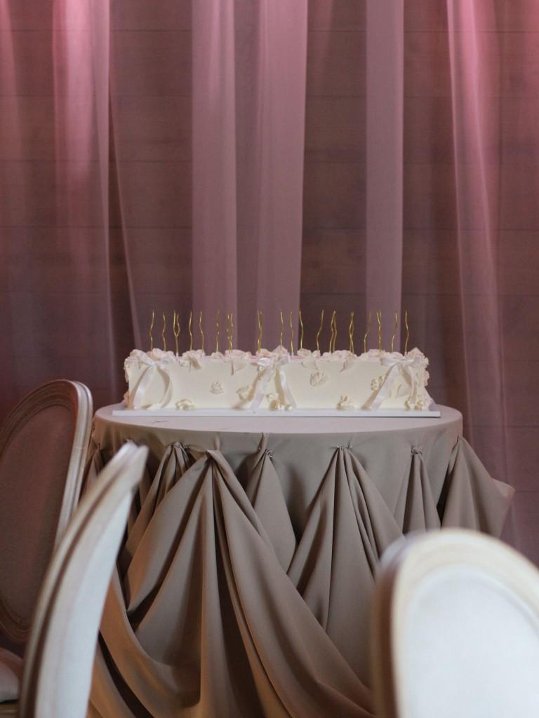 Bespoke wedding cake on a silver stand